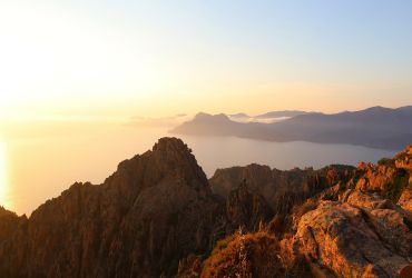 Saulėlydis nuo Calanques de Piana uolų